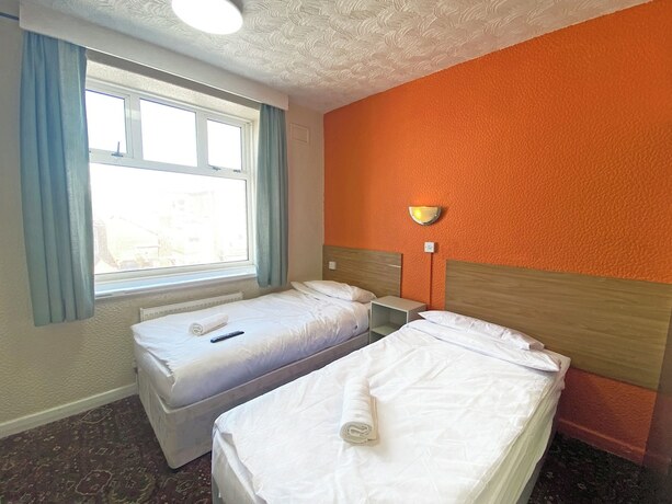 Imagen de la habitación del Hotel The J and S. Foto 16