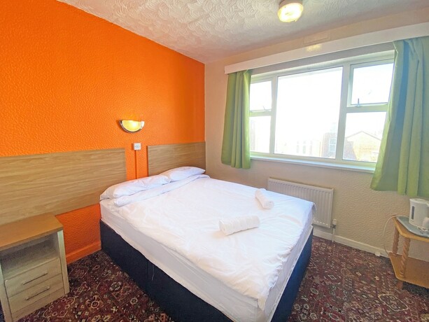 Imagen de la habitación del Hotel The J and S. Foto 17