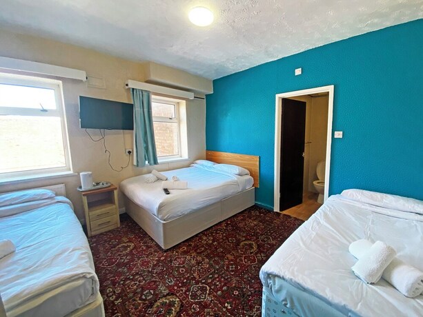 Imagen de la habitación del Hotel The J and S. Foto 18