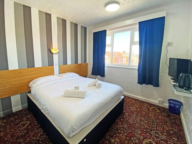 Imagen de la habitación del Hotel The J and S. Foto 19