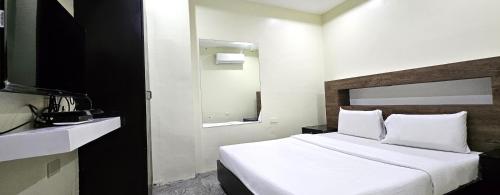 Imagen general del Hotel The JRJF near Tagum Terminal. Foto 3