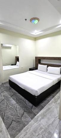 Imagen de la habitación del Hotel The JRJF near Tagum Terminal. Foto 14