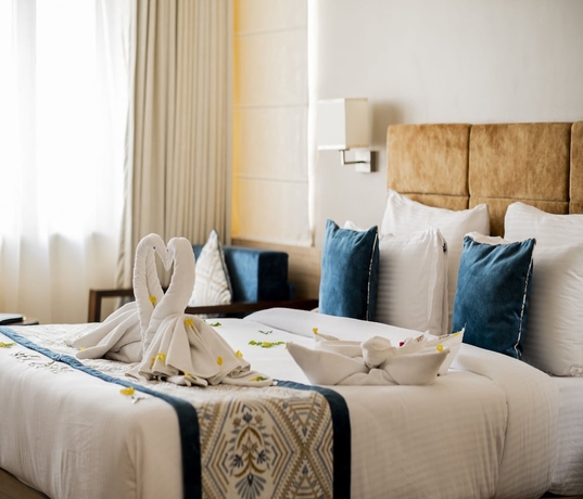 Imagen de la habitación del Hotel The Jagat Hotel and Spa Udaipur. Foto 11