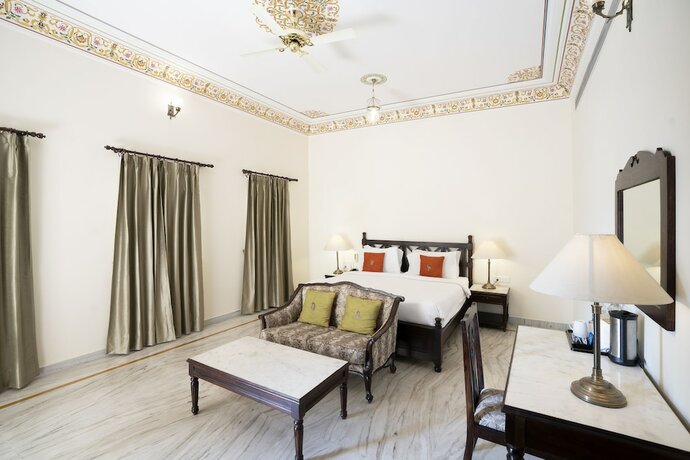 Imagen de la habitación del Hotel The Jaibagh Palace. Foto 29