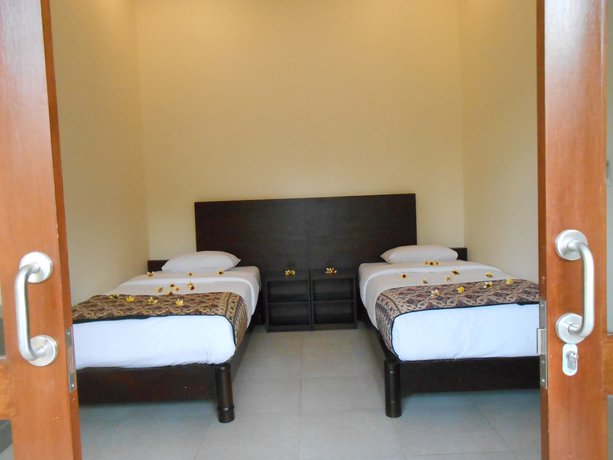 Imagen de la habitación del Hotel The Janan Villa. Foto 2