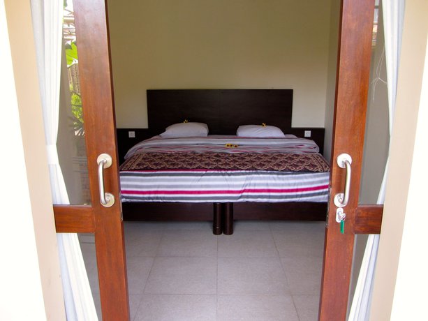 Imagen de la habitación del Hotel The Janan Villa. Foto 4