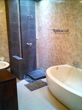 Imagen de la habitación del Hotel The Janan Villa. Foto 5