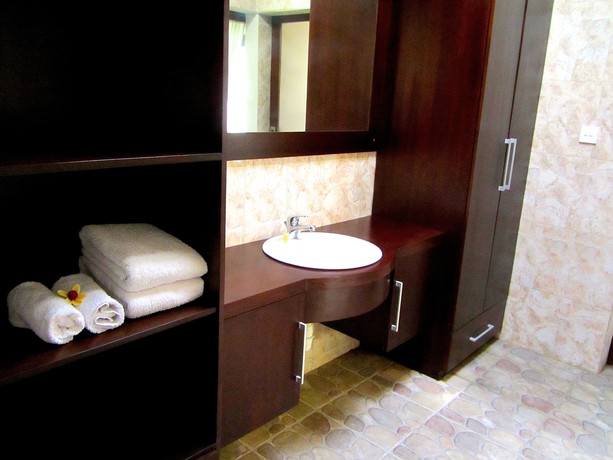 Imagen de la habitación del Hotel The Janan Villa. Foto 8