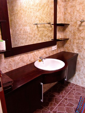 Imagen de la habitación del Hotel The Janan Villa. Foto 10
