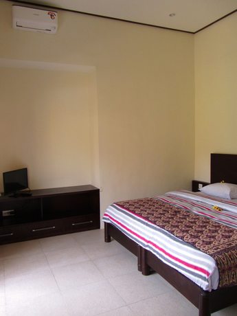 Imagen de la habitación del Hotel The Janan Villa. Foto 16