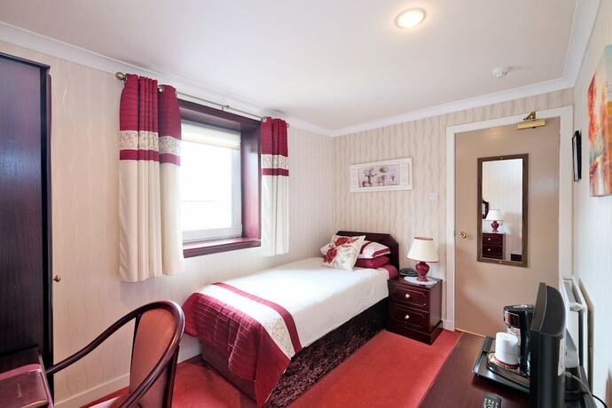 Imagen de la habitación del Hotel The Jays Guest House. Foto 14