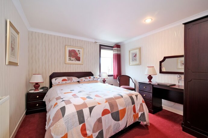 Imagen de la habitación del Hotel The Jays Guest House. Foto 16