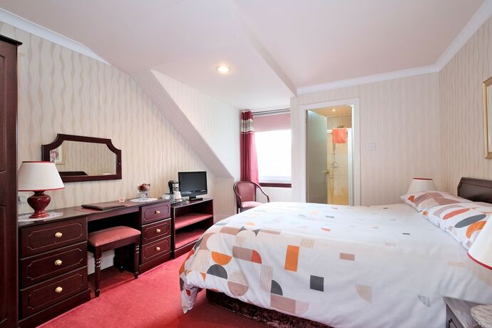 Imagen de la habitación del Hotel The Jays Guest House. Foto 17