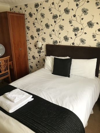Imagen de la habitación del Hotel The Jester Country Inn. Foto 13
