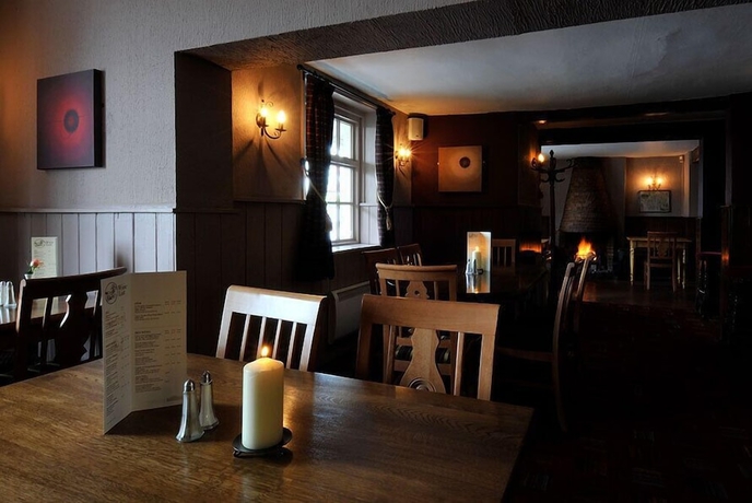 Imagen del bar/restaurante del Hotel The Jester Country Inn. Foto 4