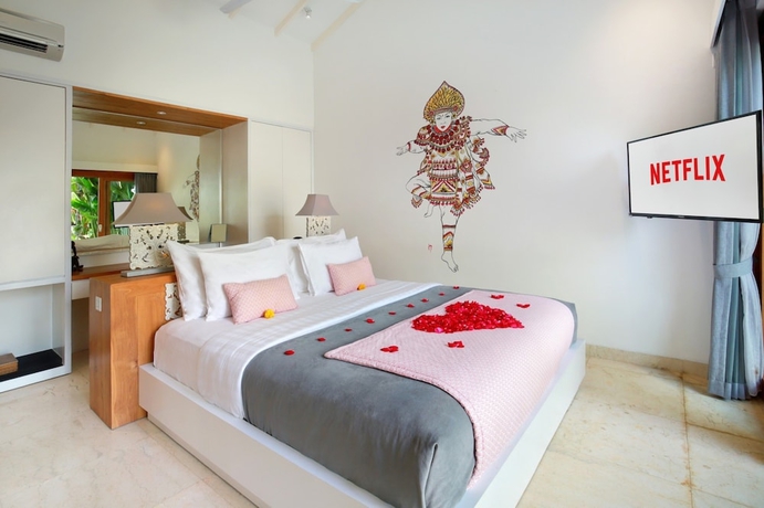 Imagen de la habitación del Hotel The Jimbaran Villa. Foto 5