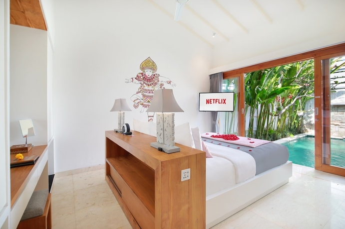 Imagen de la habitación del Hotel The Jimbaran Villa. Foto 6