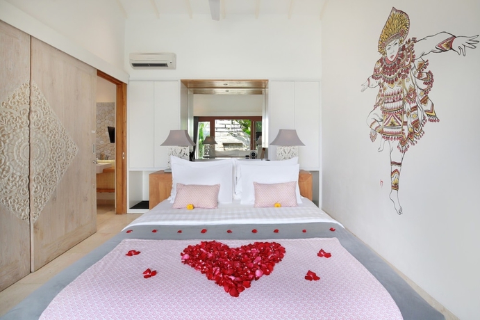 Imagen de la habitación del Hotel The Jimbaran Villa. Foto 8