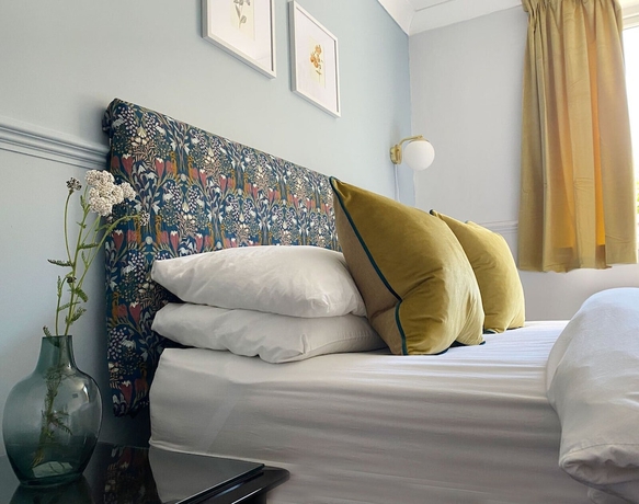 Imagen de la habitación del Hotel The Jingles. Foto 13