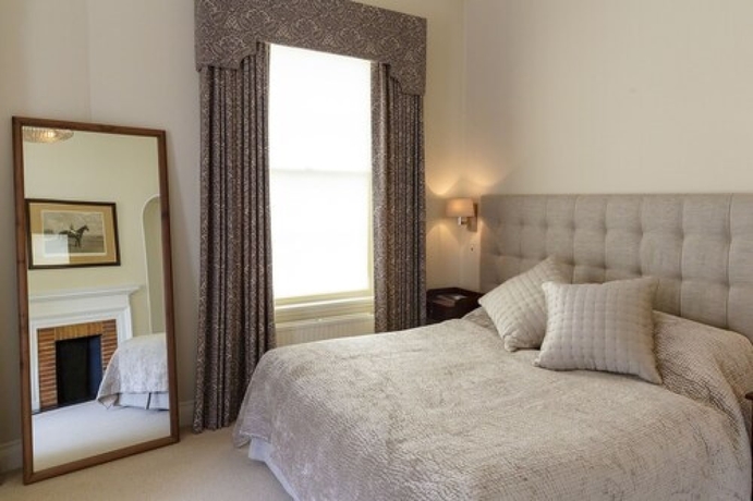 Imagen de la habitación del Hotel The Jockey Club Rooms. Foto 10