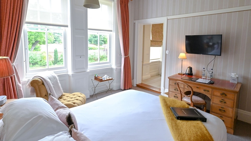 Imagen de la habitación del Hotel The Jockey Club Rooms. Foto 15