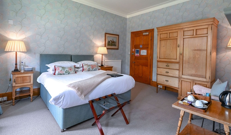 Imagen de la habitación del Hotel The Jockey Club Rooms. Foto 18