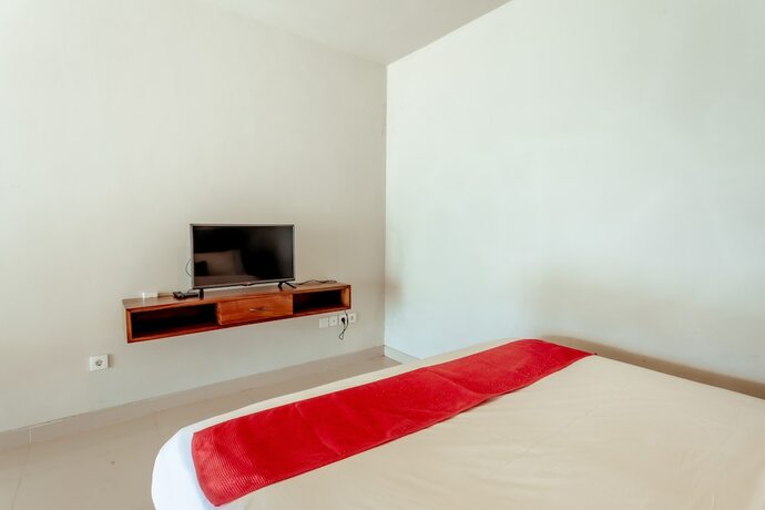 Imagen de la habitación del Hotel The Joglo Beratan. Foto 18