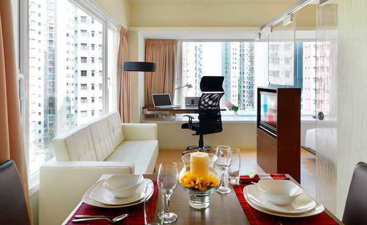 Imagen de la habitación del Hotel The Johnston Suites Hong Kong Serviced Apartments. Foto 3