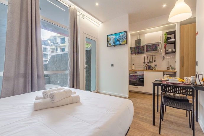 Imagen de la habitación del Hotel The Jolie Apartments. Foto 5