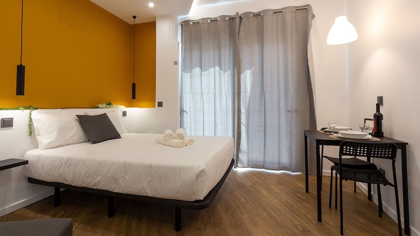 Imagen de la habitación del Hotel The Jolie Apartments. Foto 8