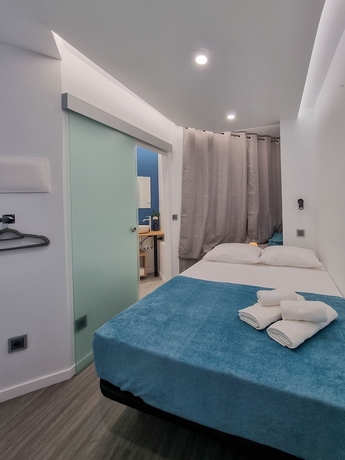 Imagen de la habitación del Hotel The Jolie Apartments. Foto 9