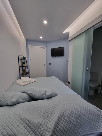 Imagen de la habitación del Hotel The Jolie Apartments. Foto 10