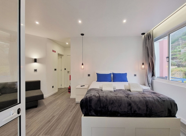Imagen de la habitación del Hotel The Jolie Apartments. Foto 11