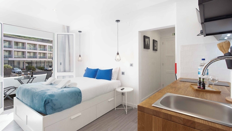 Imagen de la habitación del Hotel The Jolie Apartments. Foto 15