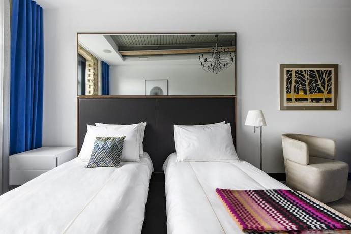Imagen de la habitación del Hotel The Joseph Boutique Suites. Foto 7