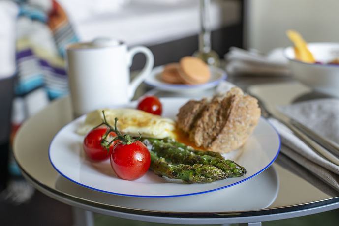 Imagen del bar/restaurante del Hotel The Joseph Boutique Suites. Foto 4