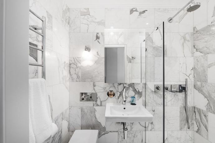 Imagen de la habitación del Hotel The Joseph Boutique Suites. Foto 11