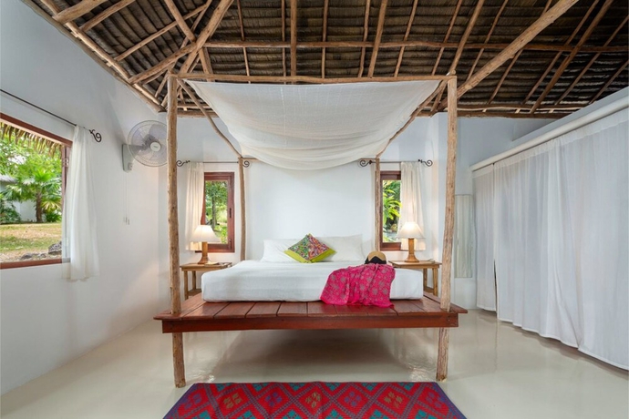 Imagen de la habitación del Hotel The Jungle Club. Foto 2