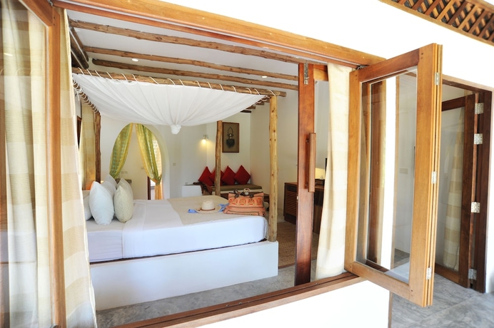 Imagen de la habitación del Hotel The Jungle Club. Foto 5