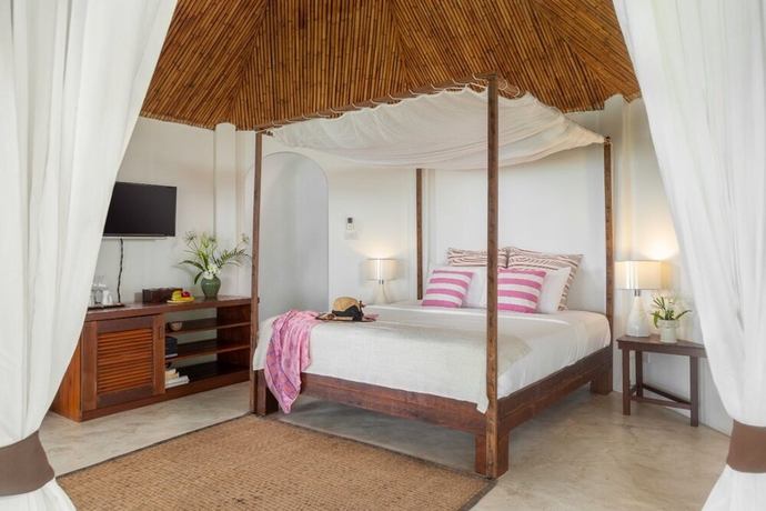 Imagen de la habitación del Hotel The Jungle Club. Foto 6