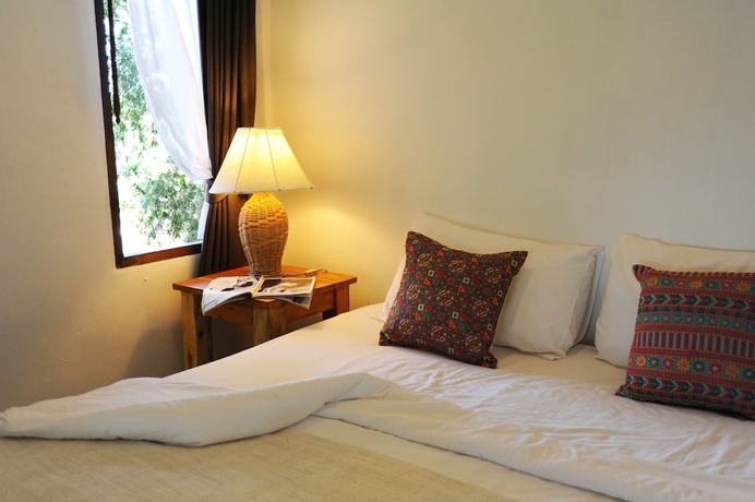 Imagen de la habitación del Hotel The Jungle Club. Foto 9