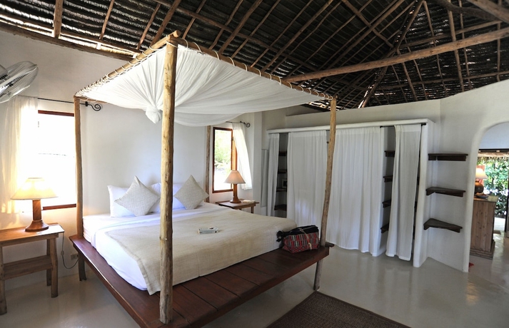 Imagen de la habitación del Hotel The Jungle Club. Foto 14