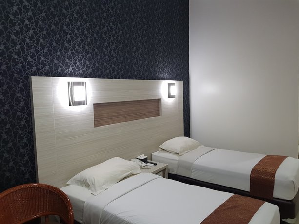 Imagen de la habitación del Hotel The K. Foto 6