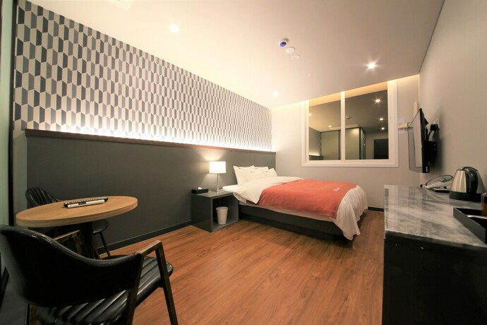 Imagen de la habitación del Hotel The K. Foto 2