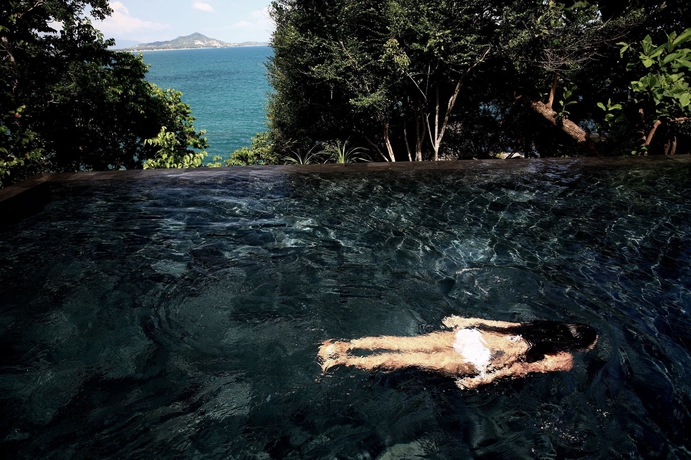 Imagen de la piscina del Hotel The Kala, Samui. Foto 15