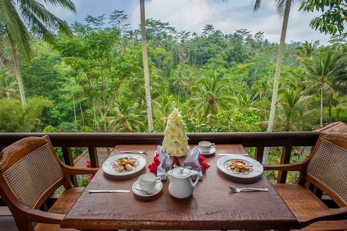 Imagen del bar/restaurante del Hotel The Kampung Resort Ubud. Foto 3