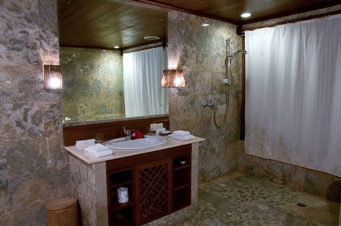 Imagen de la habitación del Hotel The Kampung Resort Ubud. Foto 5