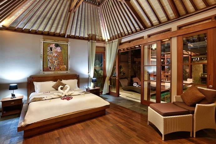 Imagen de la habitación del Hotel The Kampung Ubud Villa. Foto 5