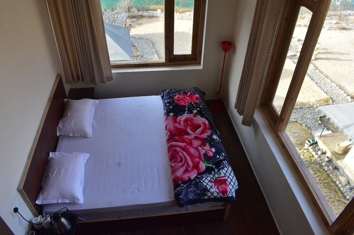 Imagen de la habitación del Hotel The Kamru Riverside Camps and Resorts. Foto 6