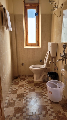 Imagen de la habitación del Hotel The Kamru Riverside Camps and Resorts. Foto 14
